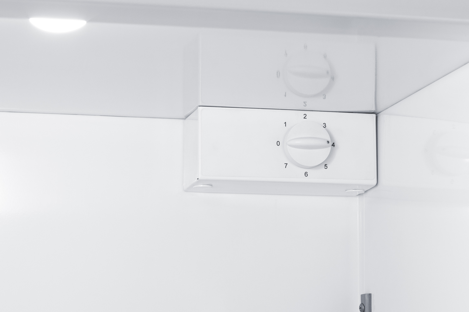 Upright commercially listed manual defrost freezer with lock